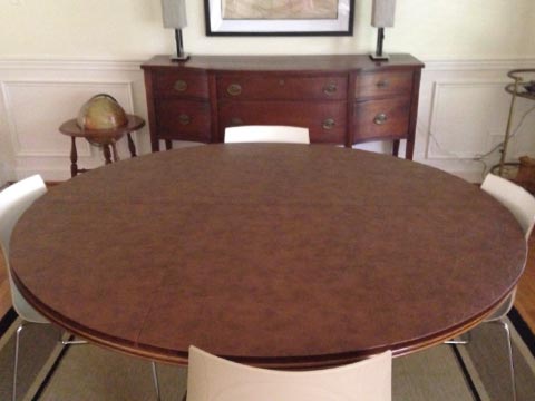 Circular leather-look dining table protector pad