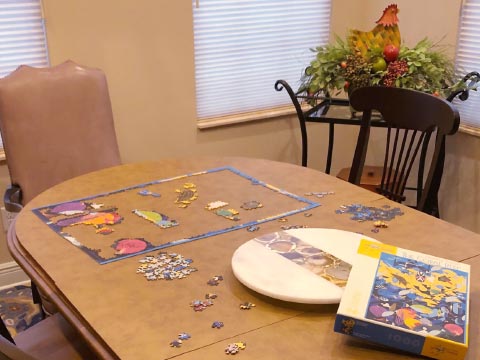 Protecting dining table for doing puzzles