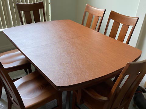 Table pad with curved ends