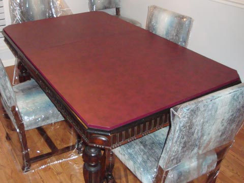 Table protector pad with truncated corners
