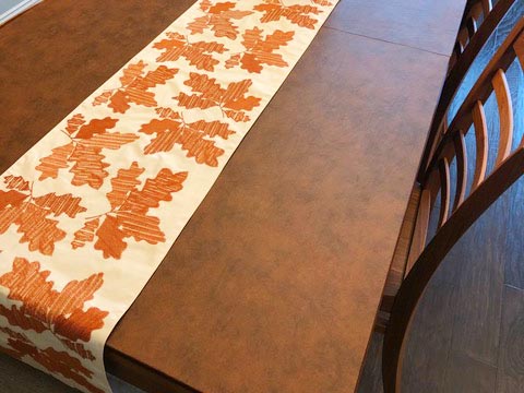 Leather-look dining table protector pad