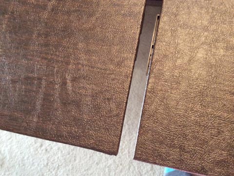 Protective table pad in separate connecting sections