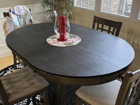 Oval capsule-shaped dining table protector, gray