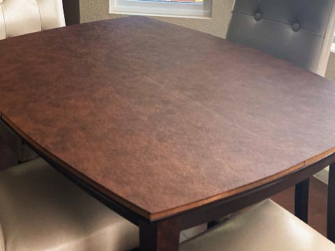 Curved edge table pad