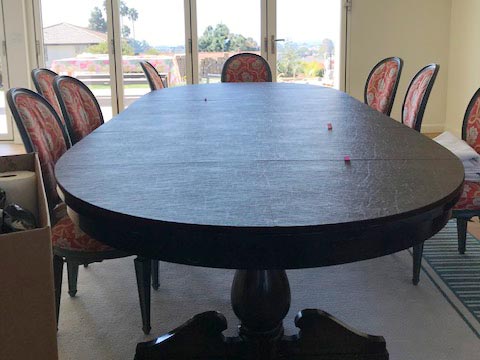 Oval-shaped dining table pad in walnut woodgrain