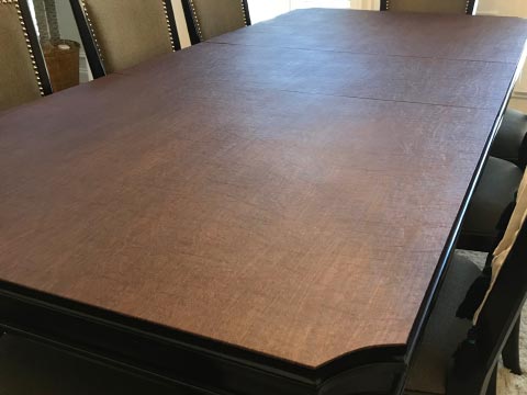 Custom table pad with concave corners