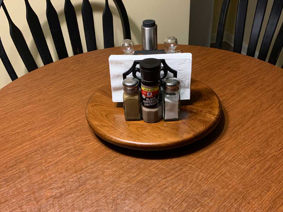 Woodgrain table protector with lazy susan