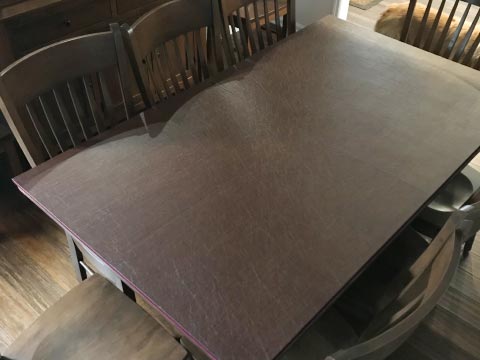 Removable dining table protector pad